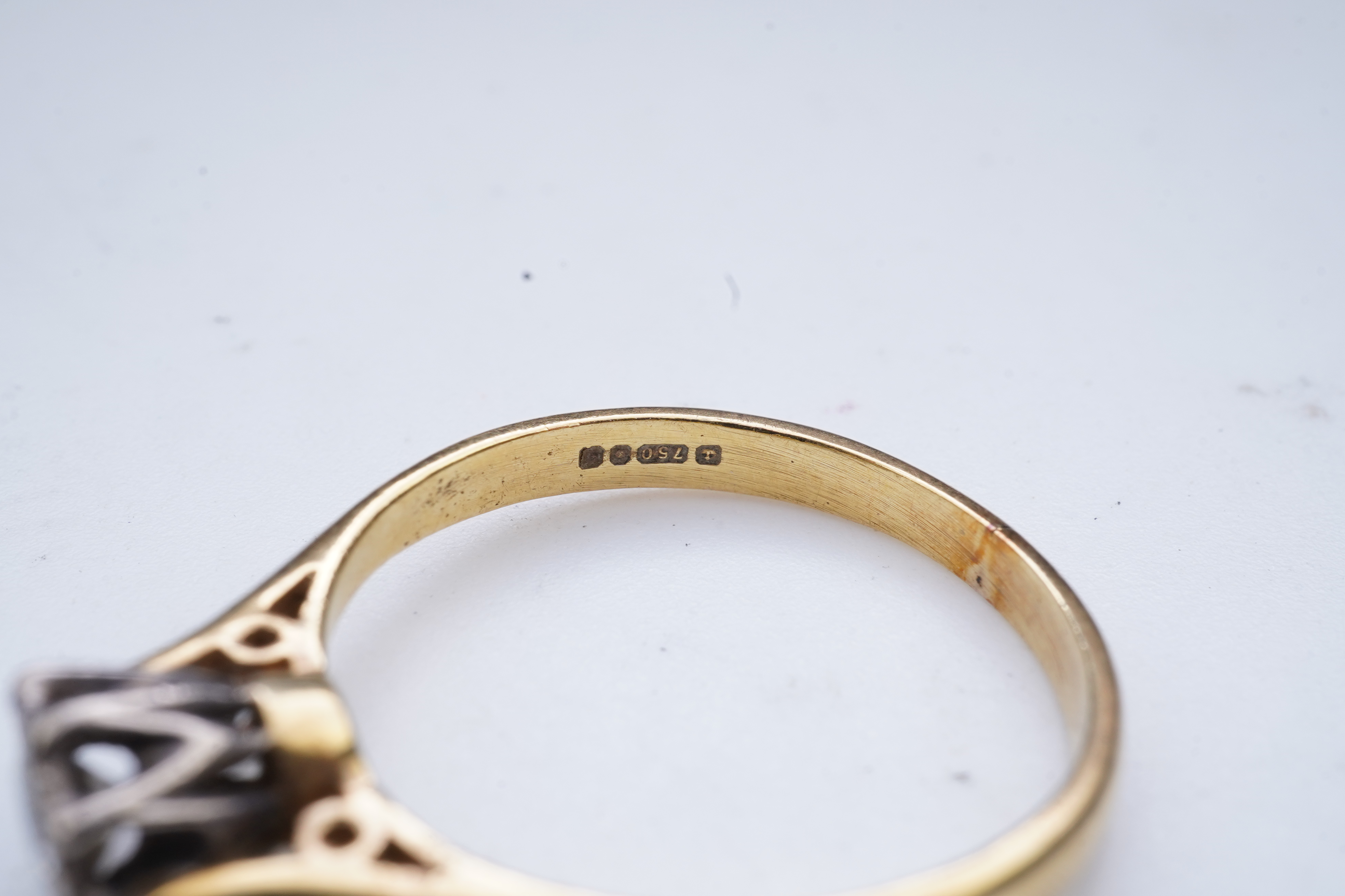 A diamond solitaire ring